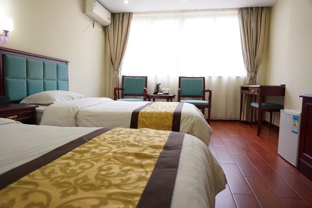 Guangdong Oversea Chinese Hotel Canton Chambre photo